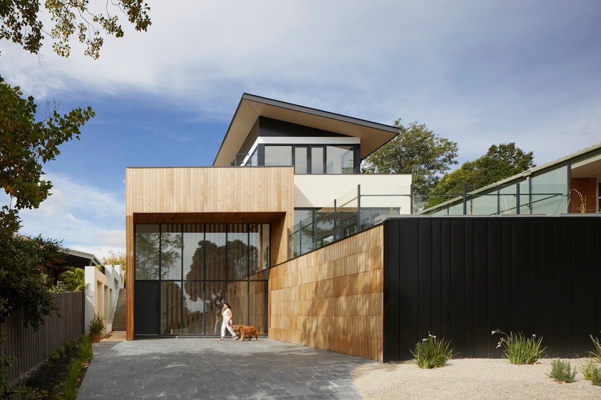 Modern house exterior with tiled outdoor area